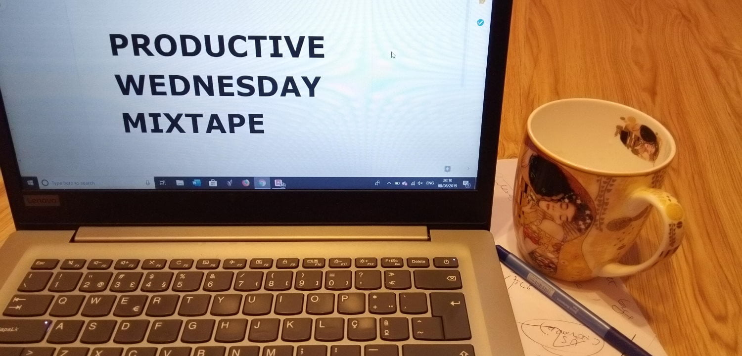 Laptop and coffee cup