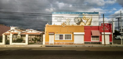 Empty Tijuana street with dramatic sky